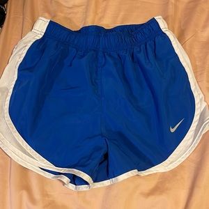 Blue Nike shorts
